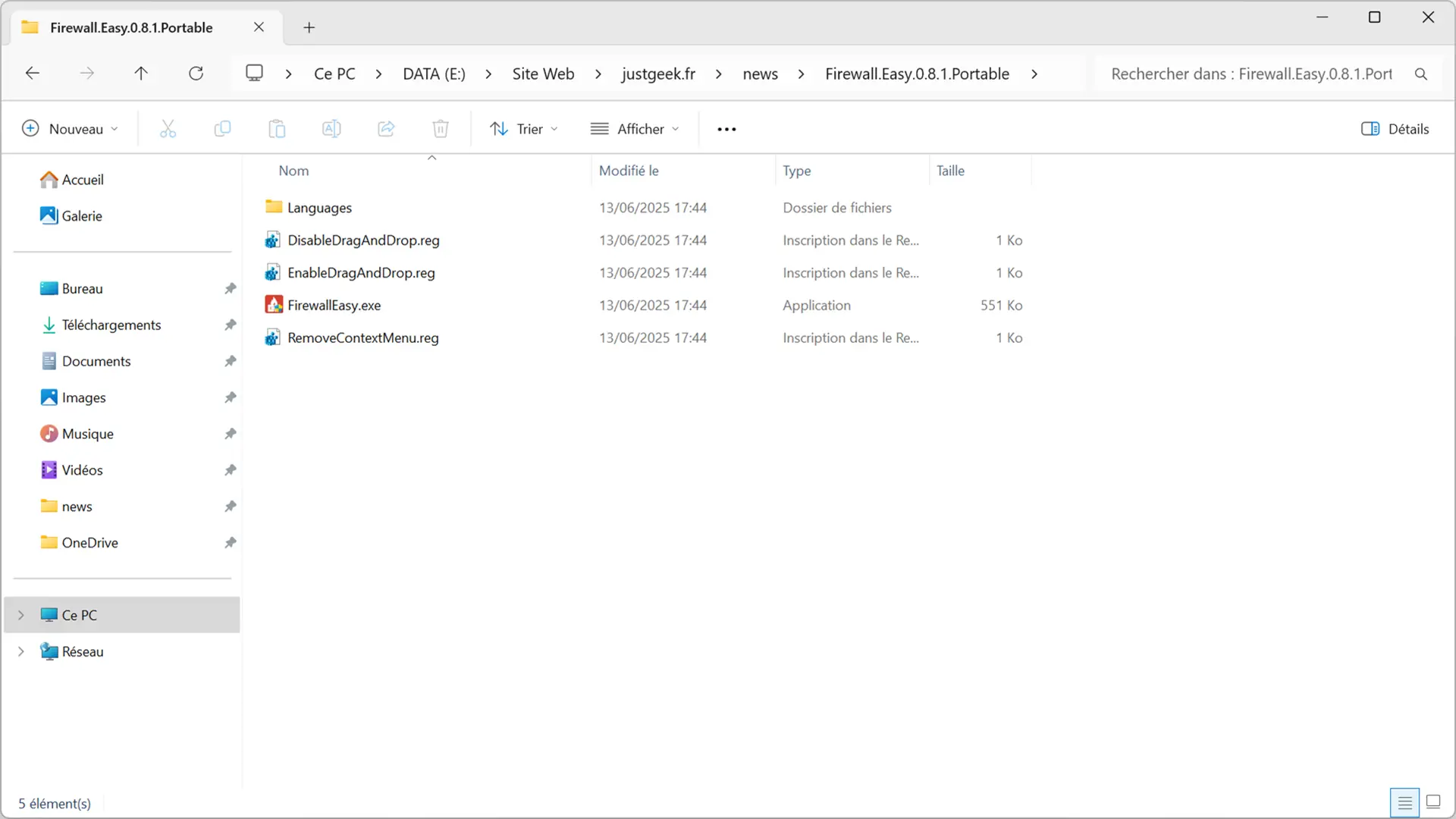 Contenu du dossier de Firewall Easy avec les fichiers .reg, l’exécutable et le dossier de langues